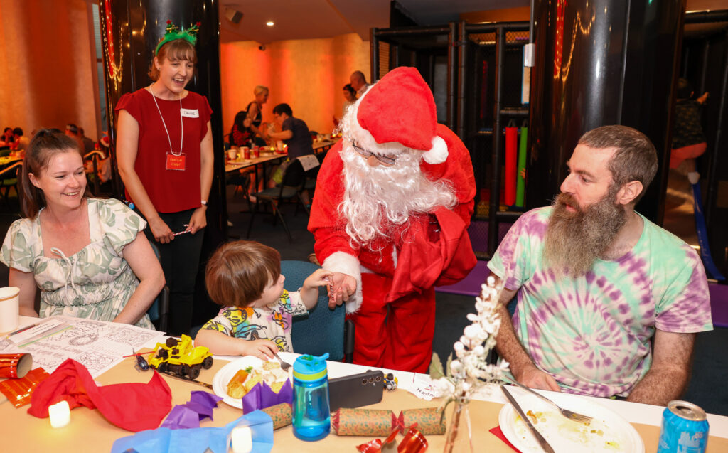 Santa visits the Northside Christmas lunch.